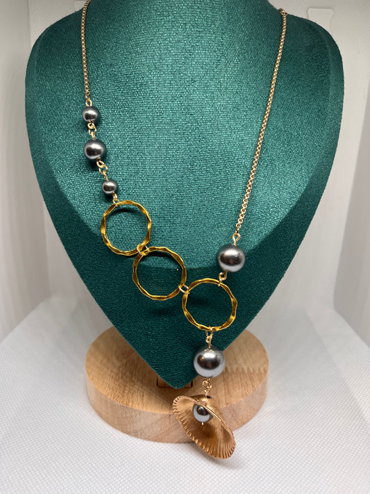 Triple Hammered Gold Circle with Grey Pearl Beads in a Gold Seashell Necklace