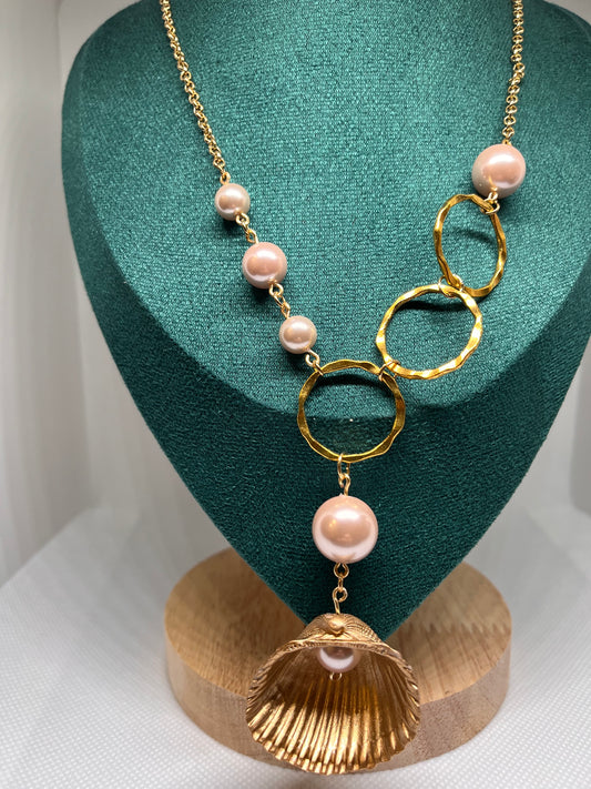 Triple Hammered Gold Circle with Pink Pearl Beads in a Gold Seashell Necklace